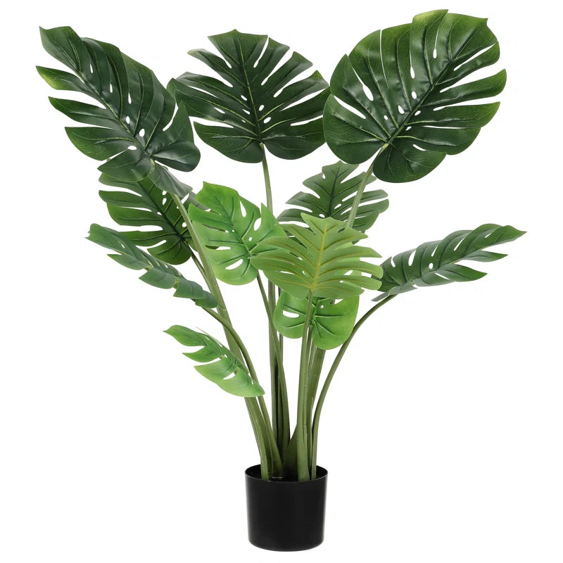 Lifelike Faux Monstera Plant featuring vibrant green split leaves