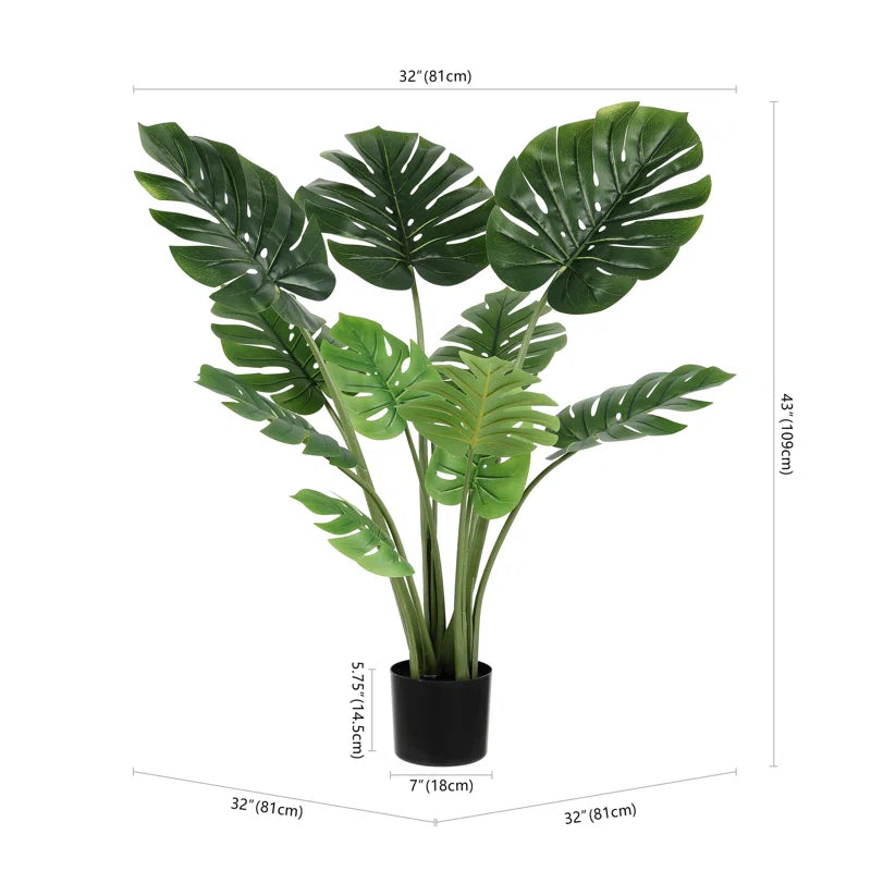 Close-up of Artificial Monstera Plant showcasing soft-touch leaves with a realistic texture.