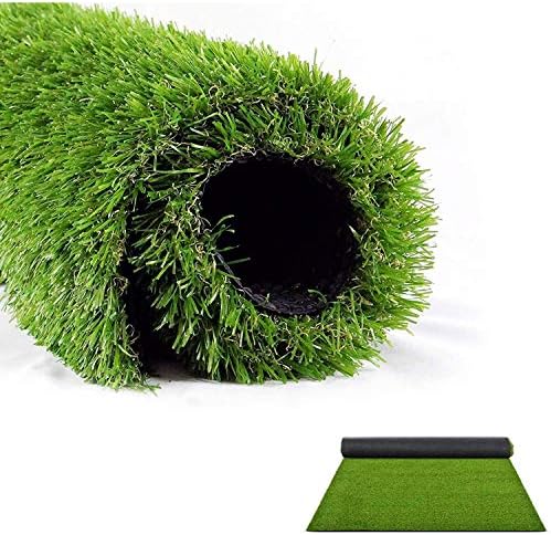Roll of artificial grass on a white background