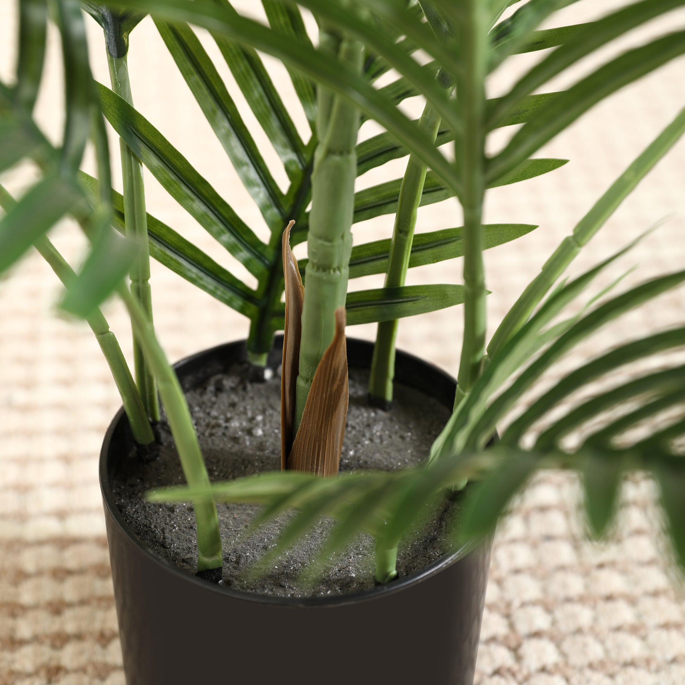 Low-maintenance Faux Palm Tree bringing lush greenery to any interior