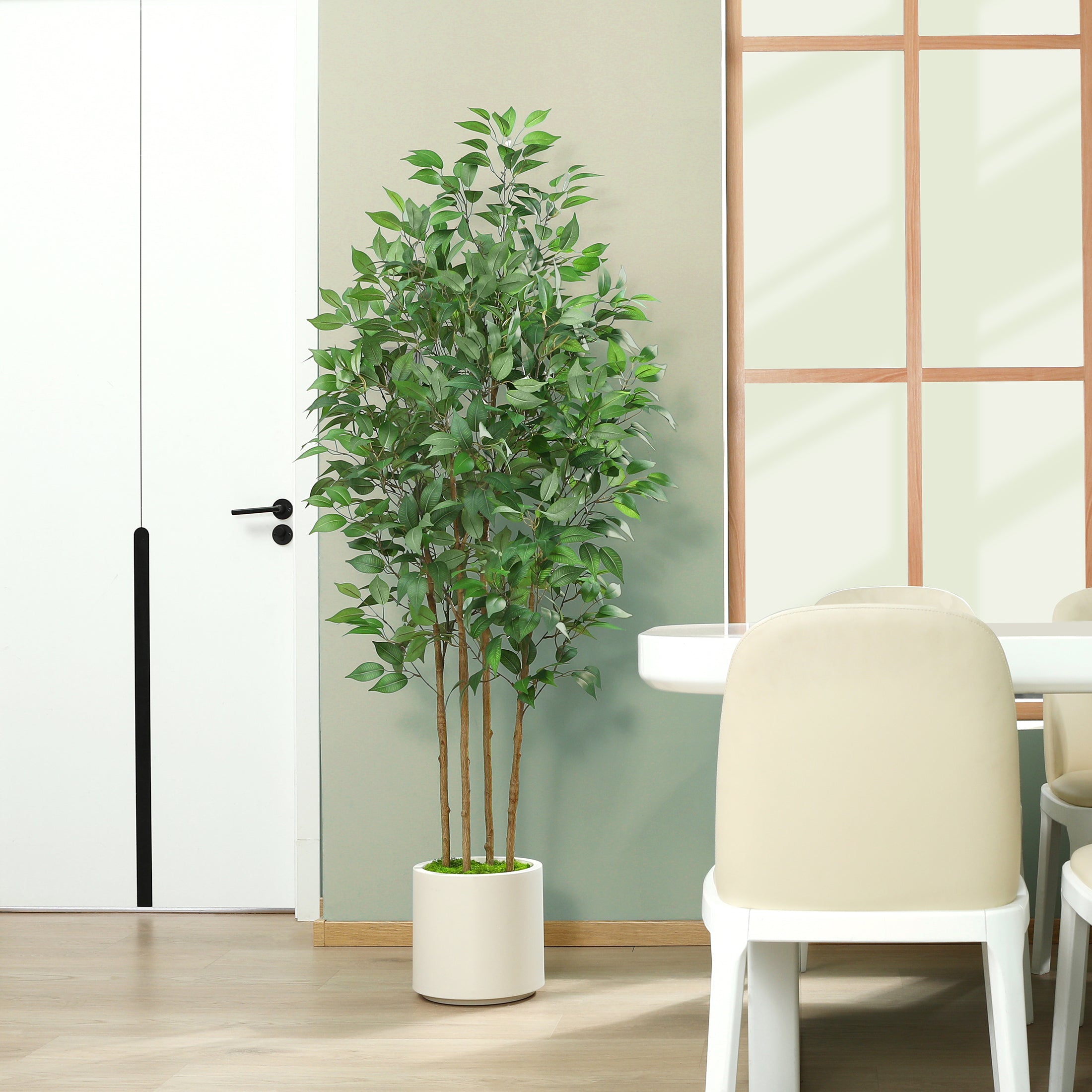 Realistic artificial faux ficus plant with lush green leaves.