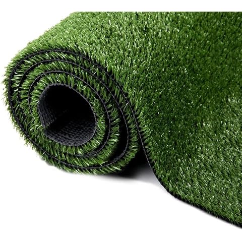 Roll of green artificial grass on a white background