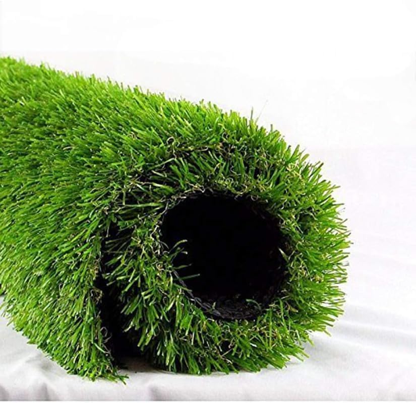 Roll of green artificial grass on a white background