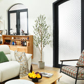 Artificial 6ft olive tree placed in a modern living room for a natural touch