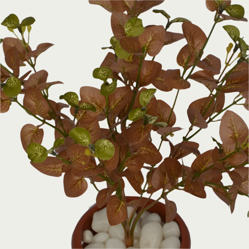 1 Ft Artificial Carpinteria Bush 5 – Faux Green Plant set on a living room table