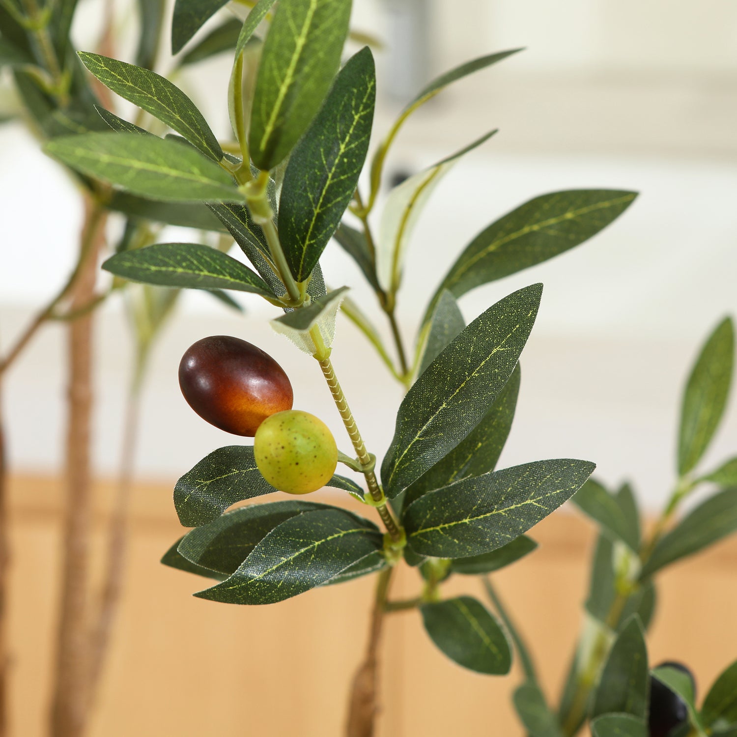 Elegant faux olive tree standing 6ft tall, perfect for home and office décor
