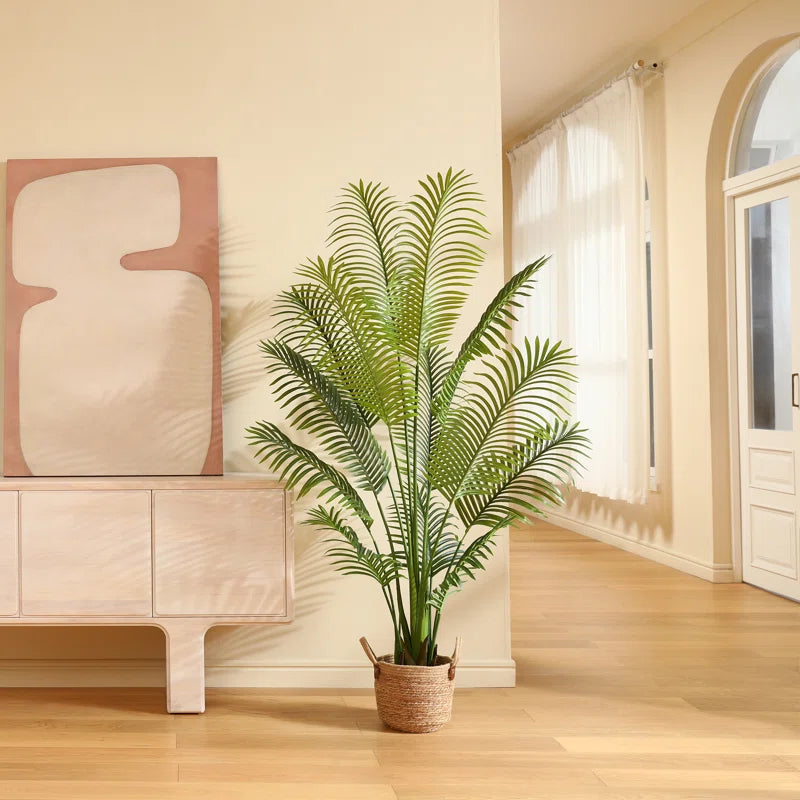 Tall faux palm tree adding a tropical touch to home and office décor