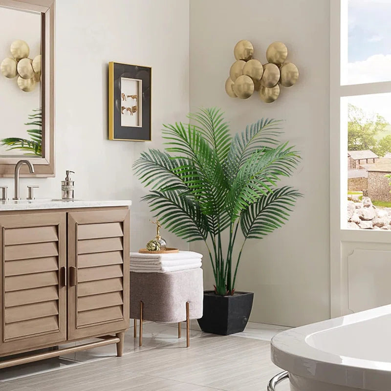 Vibrant green faux palm tree ideal for modern and tropical interiors