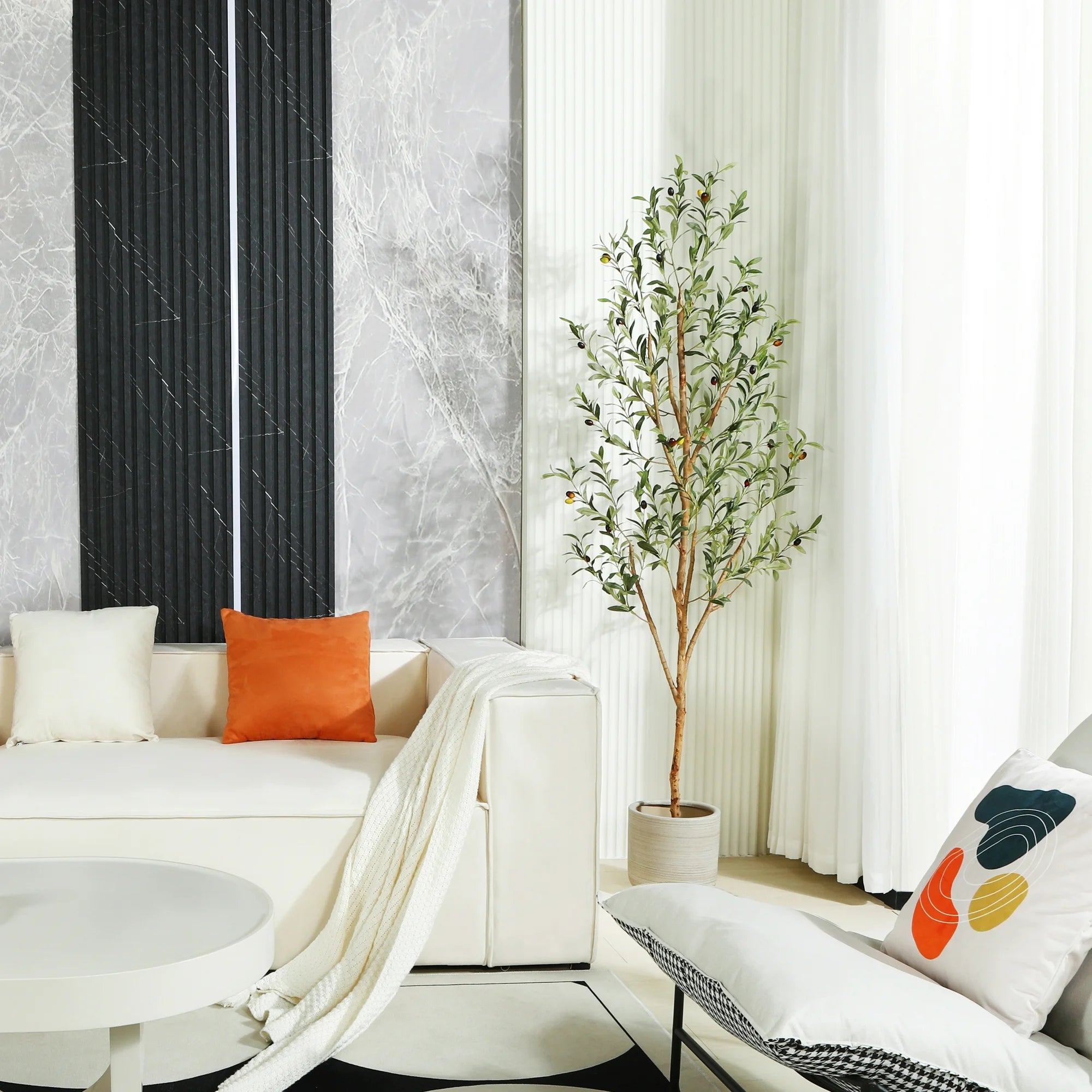Artificial olive plant standing tall, adding greenery to indoor décor