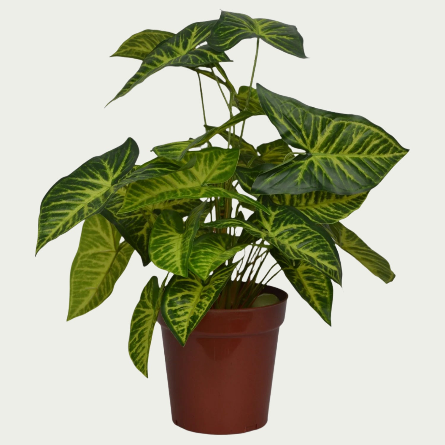 2 Ft Artificial Caladium Yellow Bush – Faux Green Plant as part of a decorative indoor arrangement