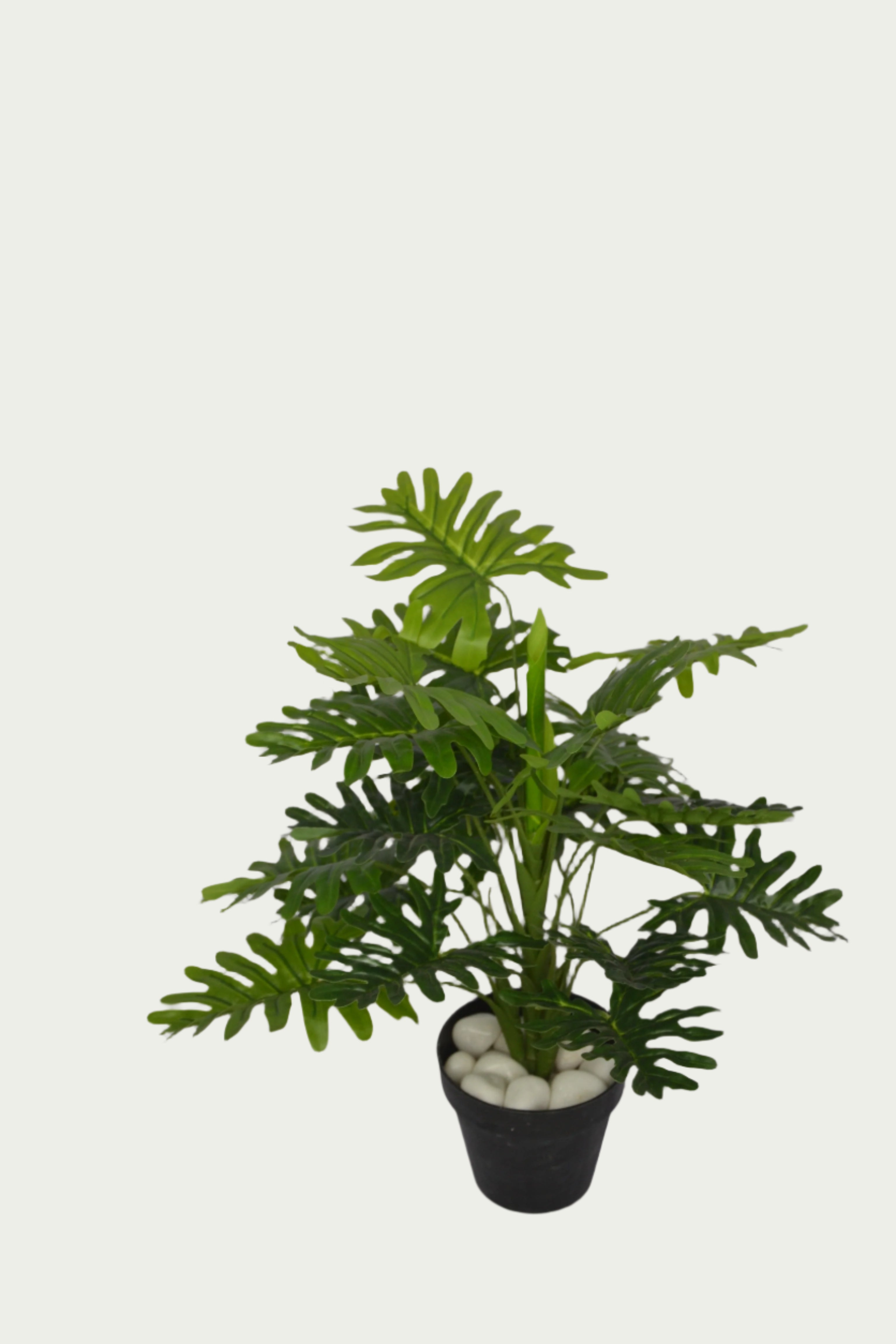 Scene featuring the 2 Ft Philodendron Bush Vibrant Faux Desk Foliage – Realistic Touch for Modern Interiors – Shop Luxiplant, styled with complementary decor items.