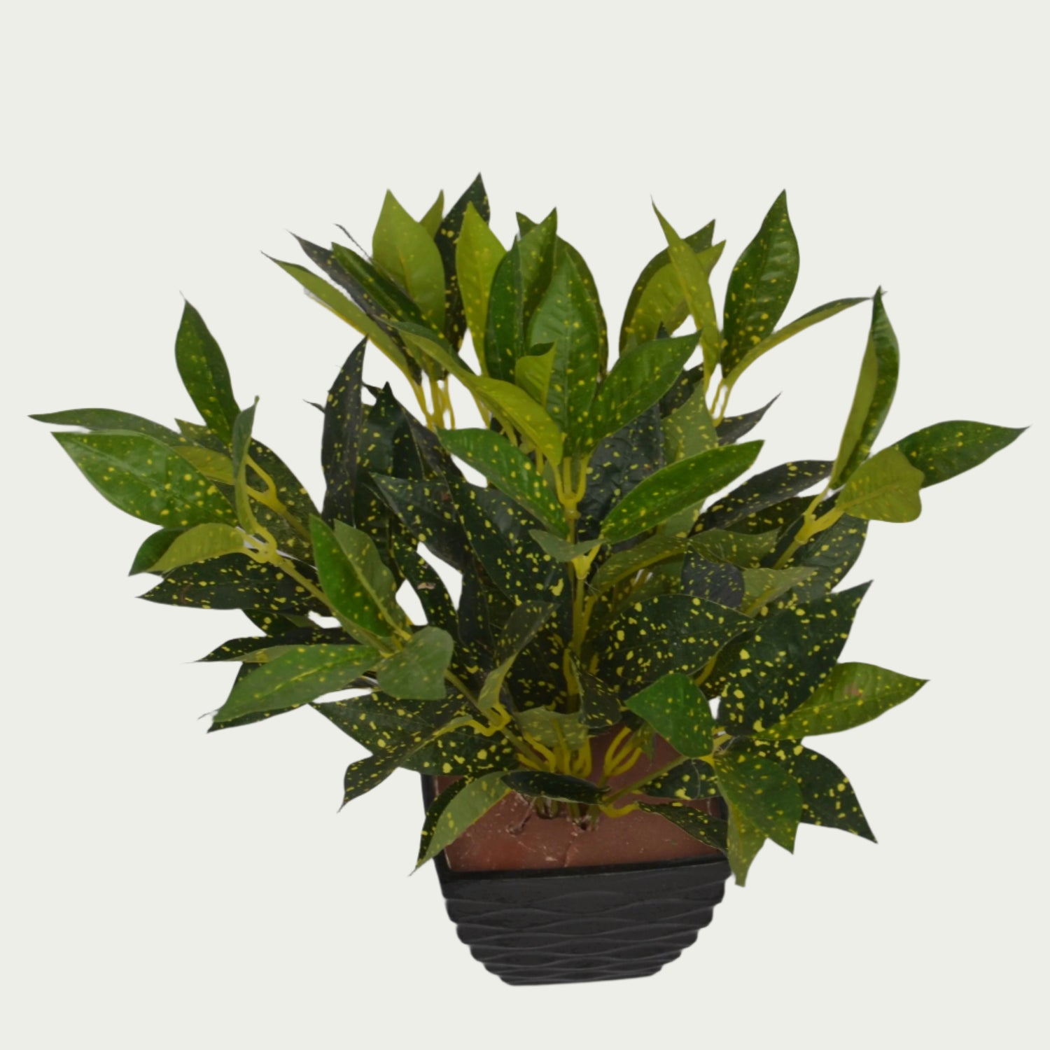 1 Ft Artificial Croton Bush – Faux Green Plant as part of a decorative indoor arrangement