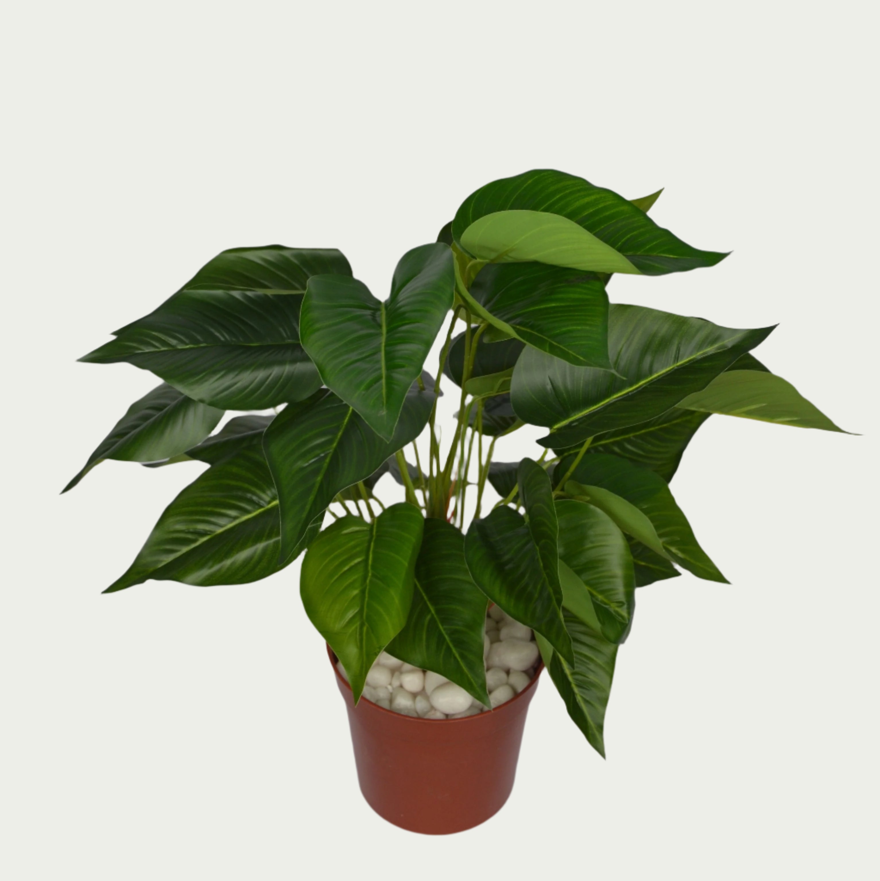 2 Ft Artificial Betel Leaf Bush – Faux Green Plant as part of a decorative indoor arrangement
