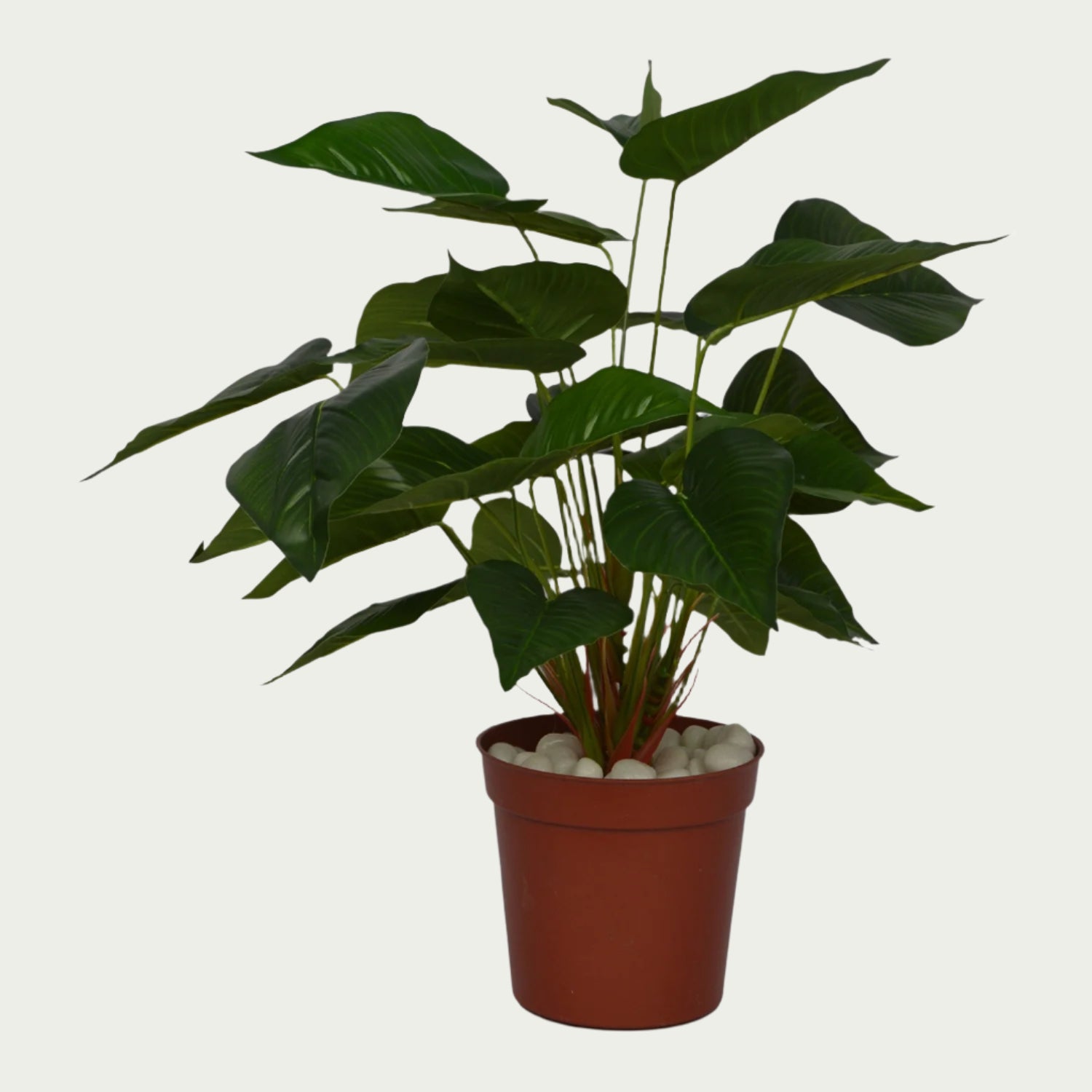 1 Ft Artificial Betel Leaf Bush 795 – Faux Green Plant set on a living room table