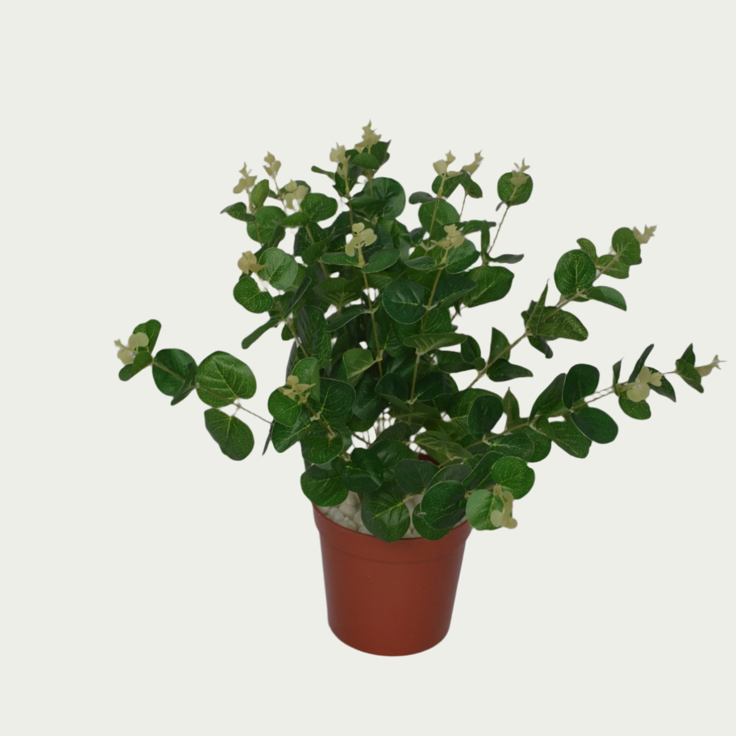 1 Ft Artificial Green Carpinteria Bush 2 – Faux Green Plant as part of a decorative indoor arrangement