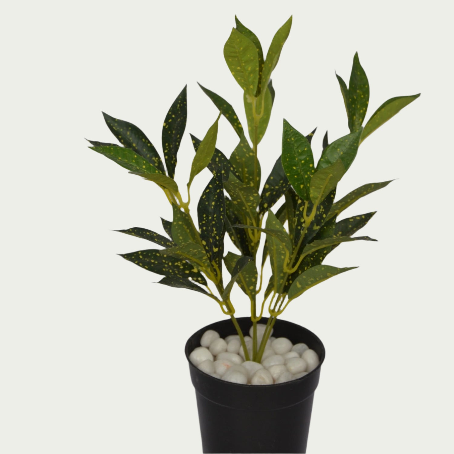 3 Ft Artificial Yellow Mini Croton Bush – Faux Green Plant as part of a decorative indoor arrangement