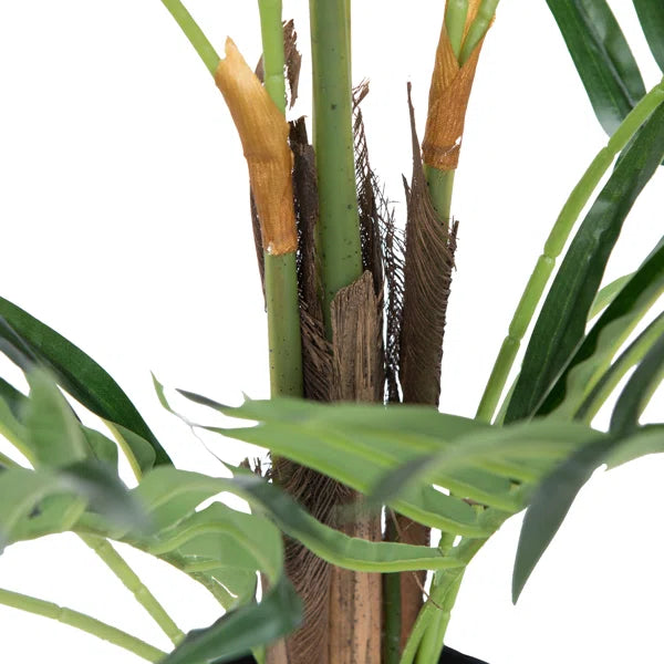 Faux fern plant with soft-touch green leaves, ideal for modern and natural home décor.