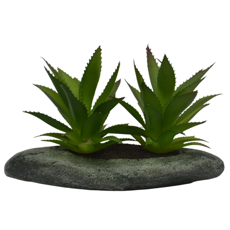 Two artificial green plants on a gray stone base against a white background