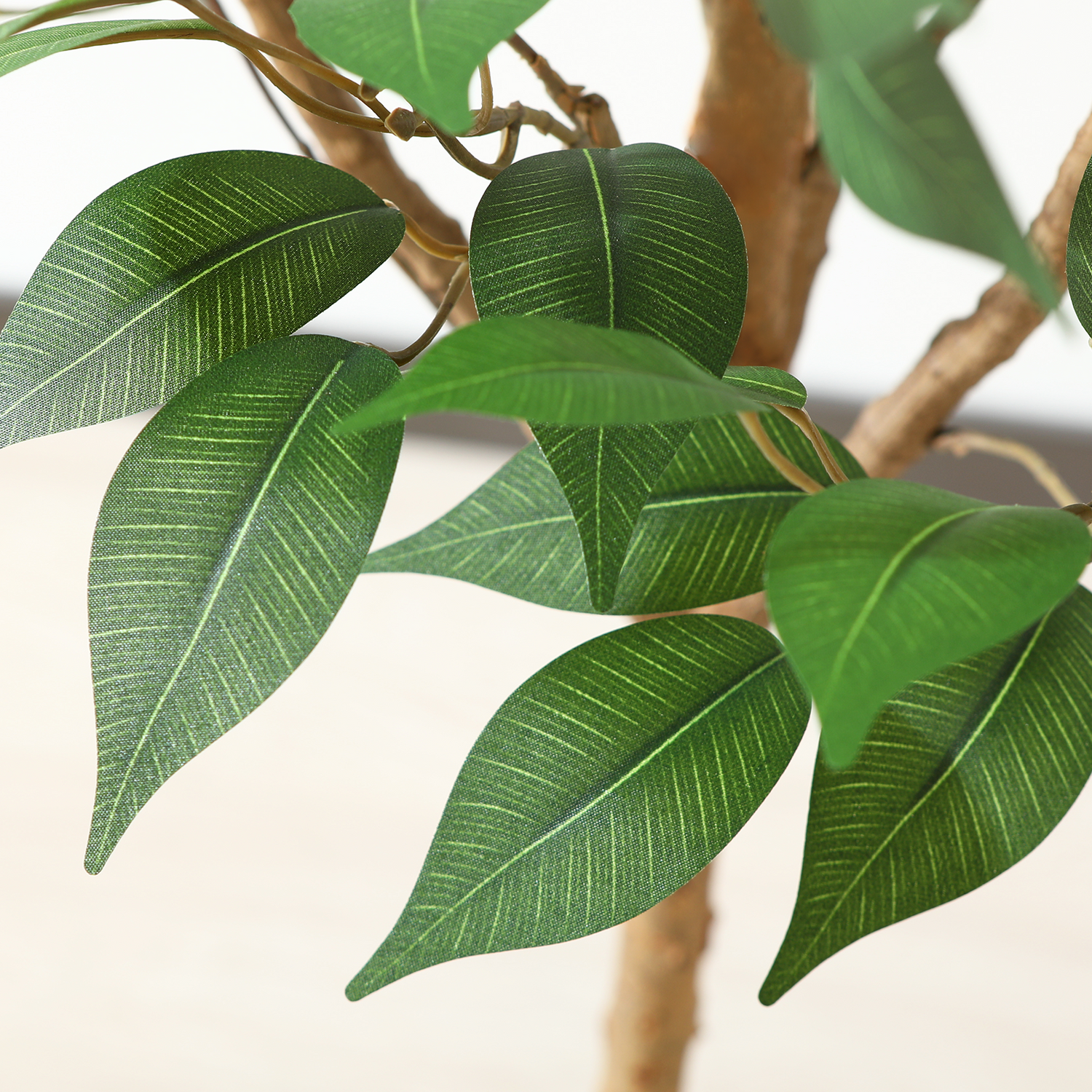Green artificial Ficus tree with high-quality fabric and wood materials