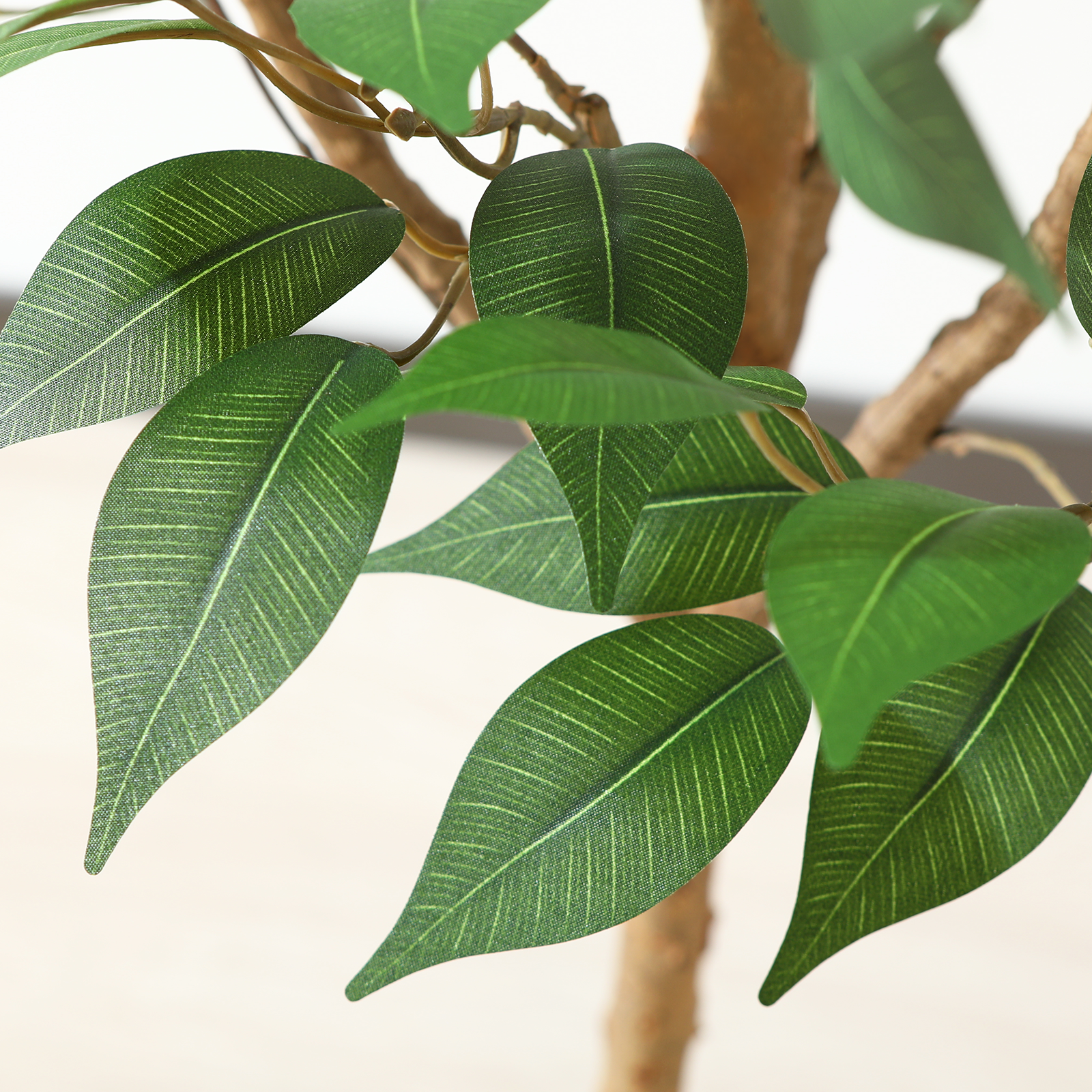 Green artificial Ficus tree with high-quality fabric and wood materials
