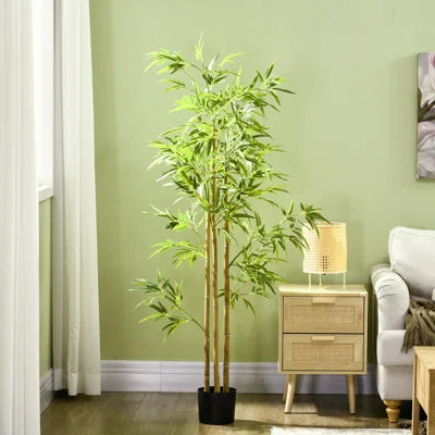 Durable and realistic fake bamboo plant requiring no watering or sunlight