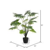 Decorative faux philodendron bush with a real-touch feel, adding a tropical touch to interiors.