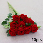 Bouquet of red roses with green leaves on a light gray background, labeled &