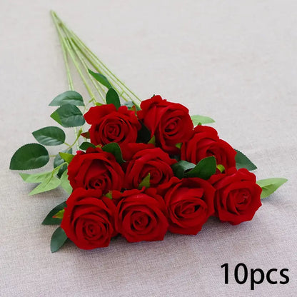 Bouquet of red roses with green leaves on a light gray background, labeled &