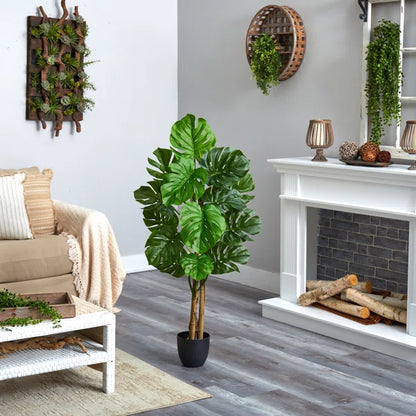 Lifelike 4ft artificial monstera tree with large soft-touch green leaves, perfect for home and office décor
