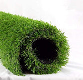 Roll of artificial grass on a white background