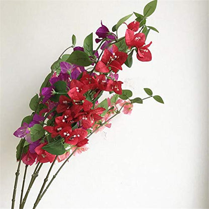 Artificial bougainvillea branch with red and purple flowers on a white background