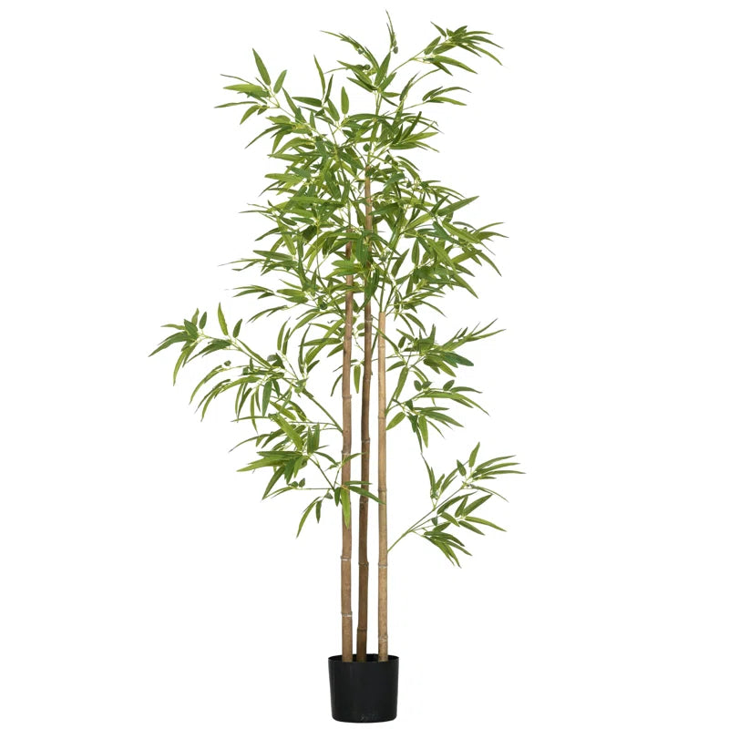 Lifelike faux bamboo plant with vibrant green leaves
