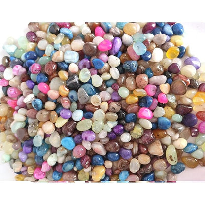 Multicolored pebbles on a white background