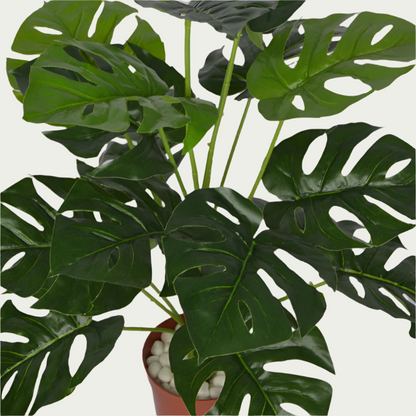 Decorative shot highlighting the unique design of 2 Ft Monstera Bush Realistic Nature-Inspired Shrub – Maintenance-Free Natural Look Accent – Shop Luxiplant.