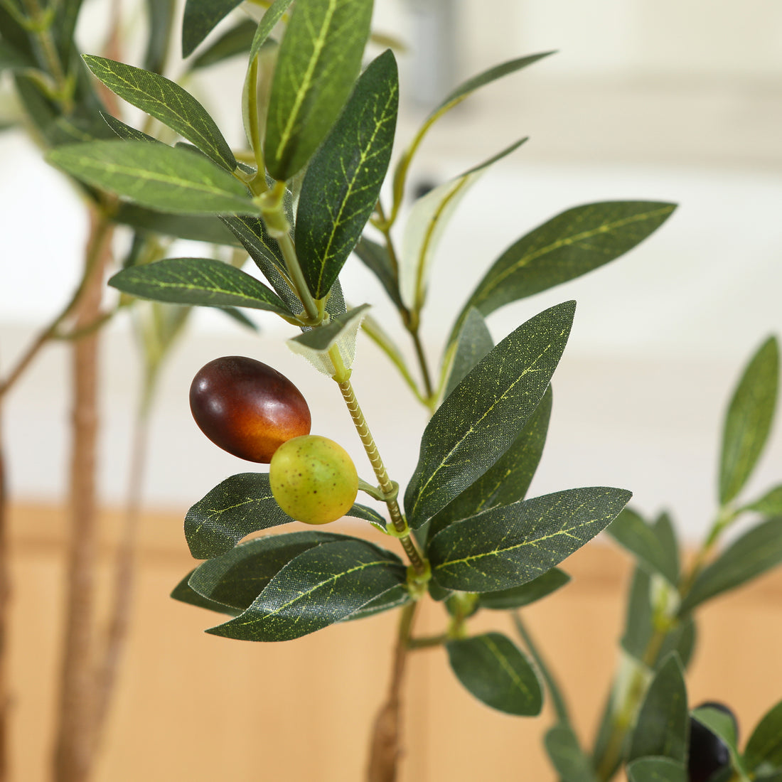 Elegant faux olive tree standing 6ft tall, perfect for home and office décor