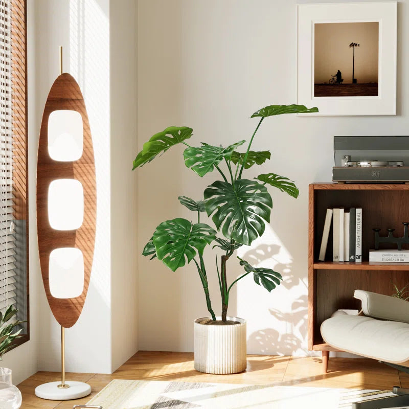 Realistic 4ft artificial Monstera Deliciosa plant with vibrant green leaves