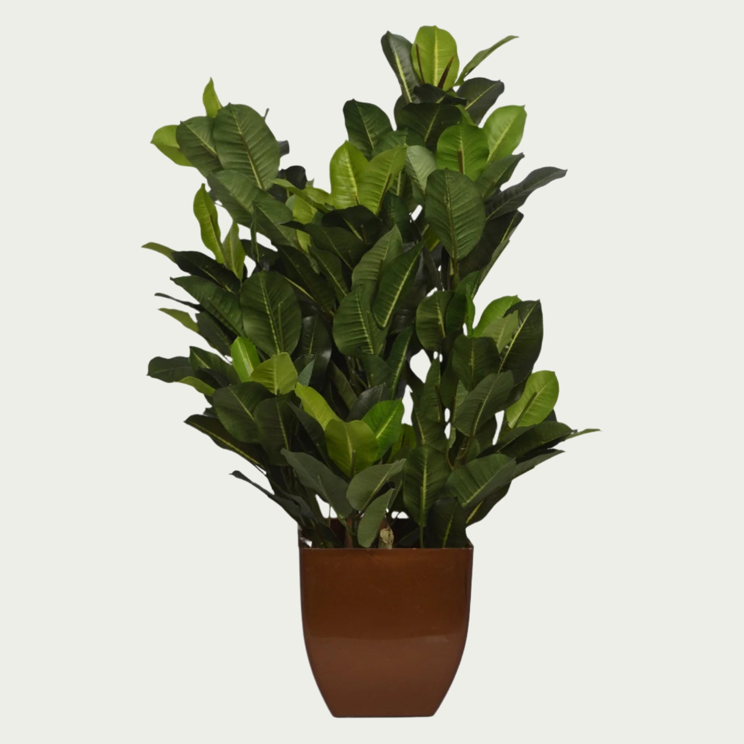 2 Ft Artificial Green Croton Bush 2975 – Faux Green Plant as part of a decorative indoor arrangement