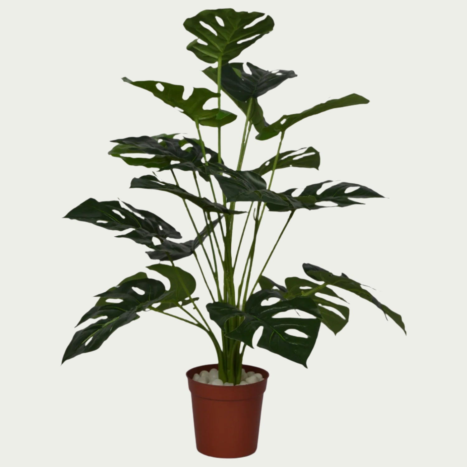 Stylish 2 Ft Monstera Bush Realistic Nature-Inspired Shrub – Maintenance-Free Natural Look Accent – Shop Luxiplant featured in a modern interior setup.