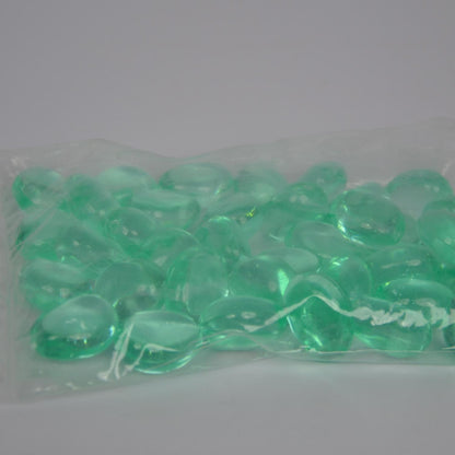 Bag of green beads on a white background
