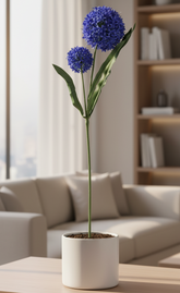 Potted plant with blue flowers on a wooden table in a living room.