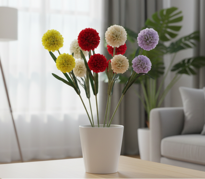 Floral arrangement in a pot on a coffee table with a living room setting.