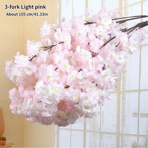 Light pink artificial flower branch with text indicating size and material.