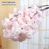 Light pink artificial flower branch with text indicating size and material.