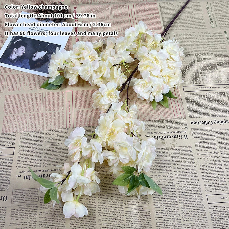 Artificial flower decoration on a newspaper background