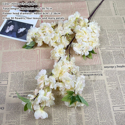 Artificial flower decoration on a newspaper background