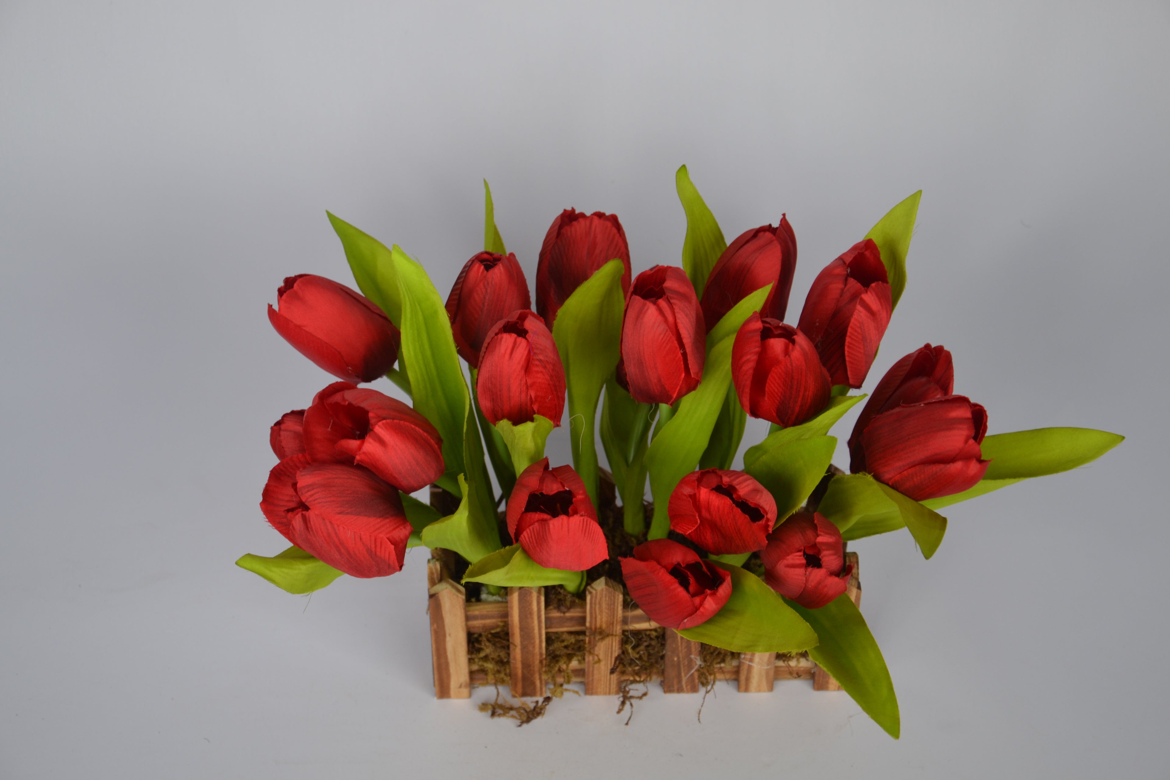 Realistic faux red tulips for table décor and interior styling