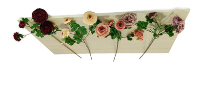 Decorative floral arrangement on a white background
