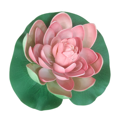 Pink flower with green leaves on a white background