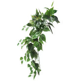 Artificial hanging green leaf garland on a white background