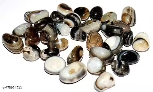 Assorted colored stones on a white background